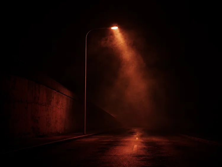 Smoke through streetlight · empty road